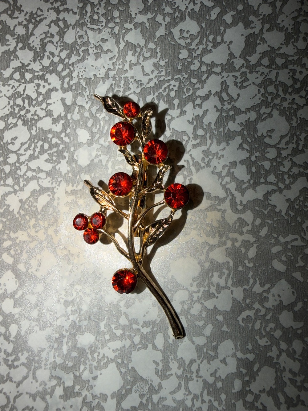Gold Branch Brooch with orange/red Gem Details